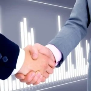 handshake isolated on business background. Handshake isolated on business background.